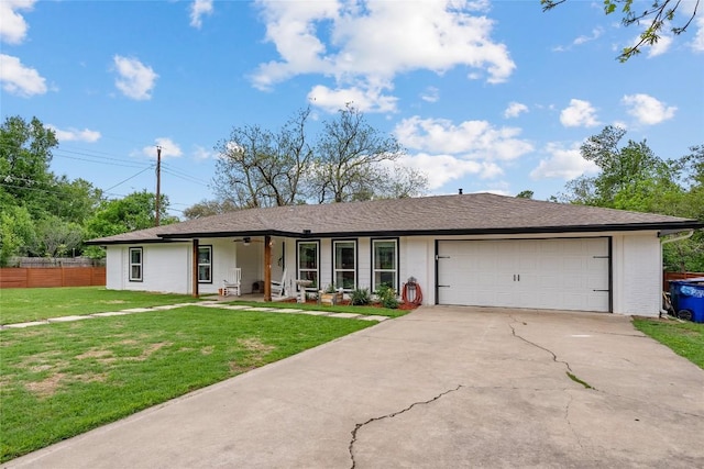 1241 Lake Terrace Dr, Elgin, TX 78621 - single story home with a front lawn, fence, a garage, and driveway