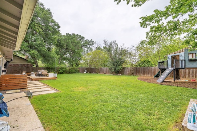 view of yard with a deck