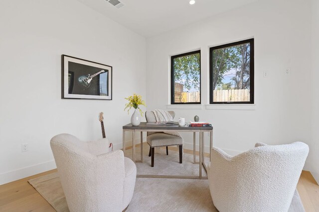 814 Stark St, Austin, TX 78756 - office area featuring baseboards and wood finished floors