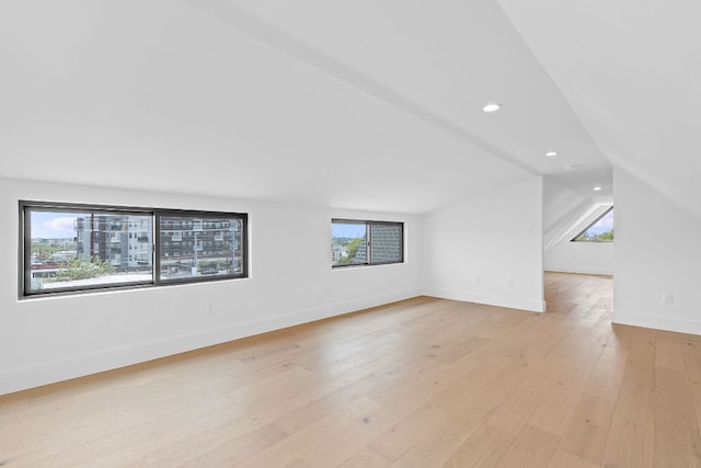 814 Stark St, Austin, TX 78756 - bonus room with healthy amount of natural light, light wood-type flooring, recessed lighting, vaulted ceiling, and baseboards