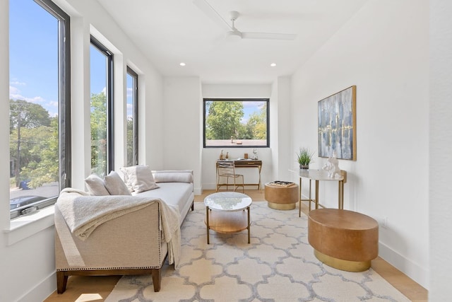 814 Stark St, Austin, TX 78756 - sitting room with wood finished floors, ceiling fan, baseboards, and recessed lighting