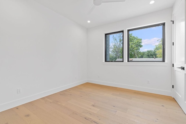 814 Stark St, Austin, TX 78756 - spare room with ceiling fan, light wood-style flooring, recessed lighting, and baseboards