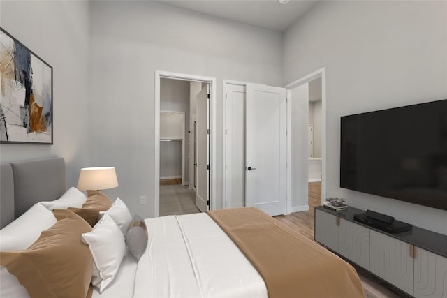 4510 Terry-O Ln Unit 141, Austin, TX 78745 - bedroom with ensuite bath and baseboards