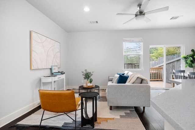 5901 Bolm Rd Unit H, Austin, TX 78721 - living area with dark wood-type flooring, ceiling fan, baseboards, and recessed lighting