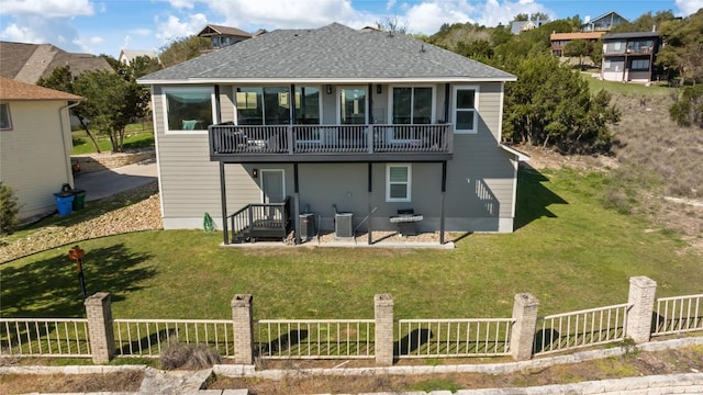 back of house with a lawn, a patio, fence private yard, and central AC