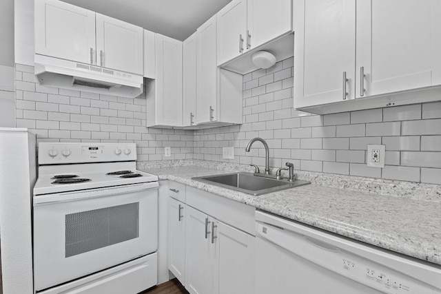 1840 Burton Dr Unit 133, Austin, TX 78741 - kitchen with white appliances, a sink, under cabinet range hood, and light countertops