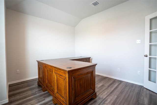 home office featuring visible vents, baseboards, vaulted ceiling, and dark wood-style floors