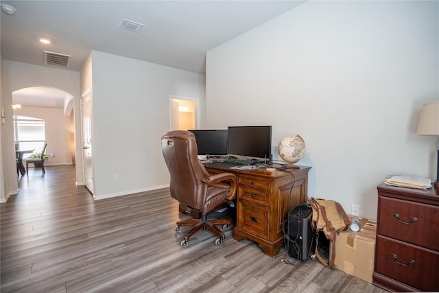 168 Onna St, Taylor, TX 76574 - office space with arched walkways and wood finished floors