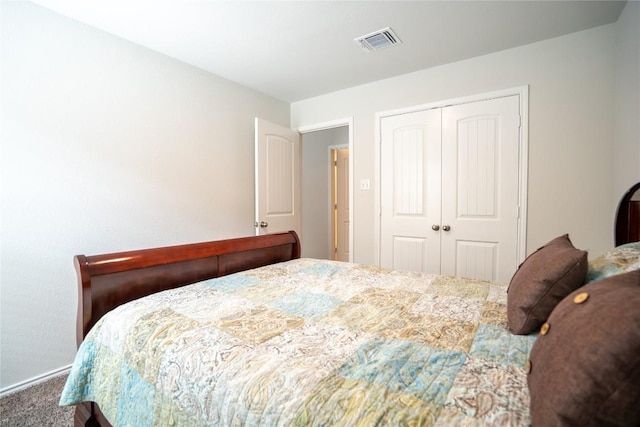 168 Onna St, Taylor, TX 76574 - carpeted bedroom featuring a closet and baseboards