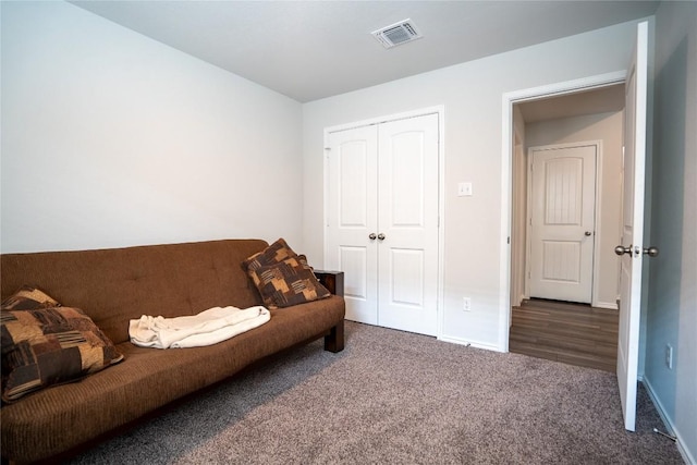 168 Onna St, Taylor, TX 76574 - living area with carpet and baseboards