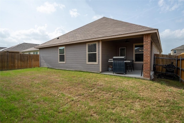 168 Onna St, Taylor, TX 76574 - back of house featuring a patio, a fenced backyard, and a ceiling fan