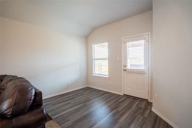 168 Onna St, Taylor, TX 76574 - unfurnished room with dark wood-type flooring and vaulted ceiling