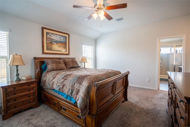 168 Onna St, Taylor, TX 76574 - carpeted bedroom with lofted ceiling, a ceiling fan, and connected bathroom