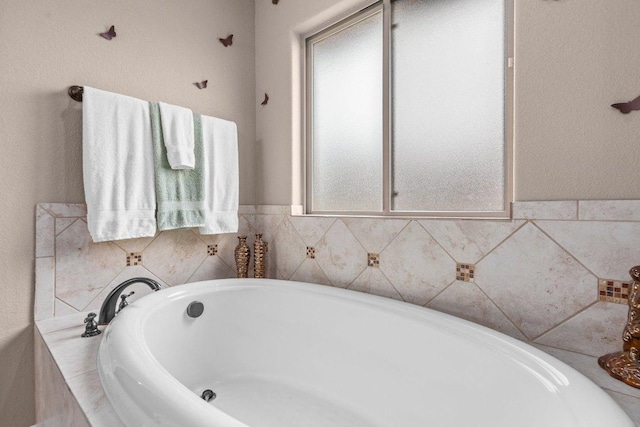 11066 La Paloma Loop, Salado, TX 76571 - full bathroom featuring healthy amount of natural light and a bath