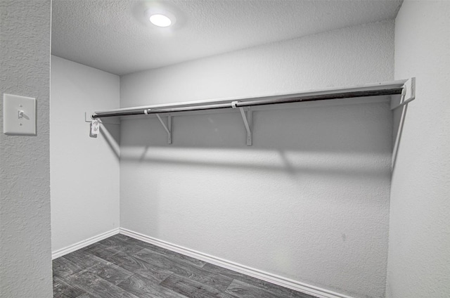 5912 Berriweather Dr, Austin, TX 78724 - spacious closet with dark wood-style floors