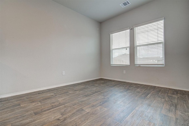 5912 Berriweather Dr, Austin, TX 78724 - empty room featuring dark wood-style floors and baseboards