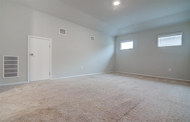 5912 Berriweather Dr, Austin, TX 78724 - carpeted empty room with baseboards and lofted ceiling