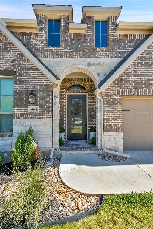 6101 Fadden Rd, Austin, TX 78738 - doorway to property with brick siding and stone siding