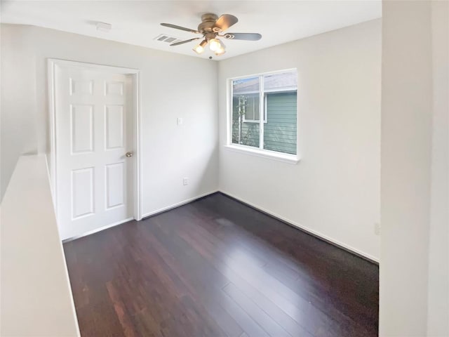 1427 Davis Mountain Loop, Cedar Park, TX 78613 - spare room with dark wood-style floors and ceiling fan