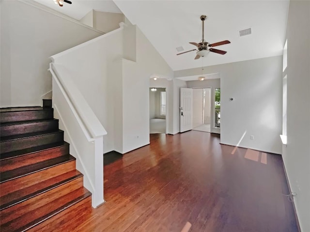 1427 Davis Mountain Loop, Cedar Park, TX 78613 - unfurnished living room with stairway, ceiling fan, wood finished floors, and high vaulted ceiling