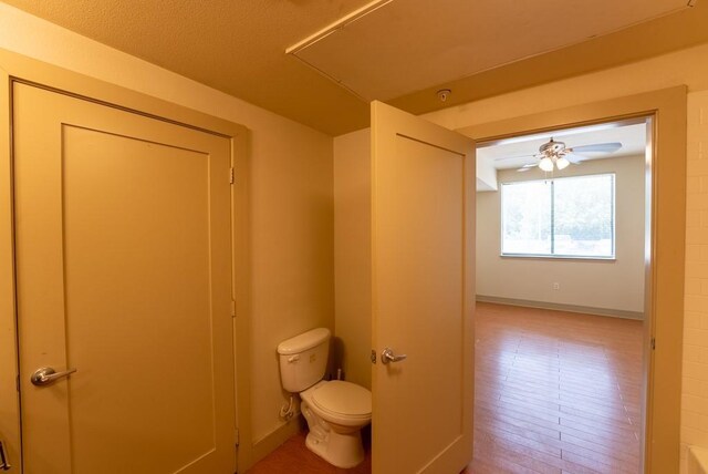3016 Guadalupe St Unit 212, Austin, TX 78705 - bathroom featuring toilet and baseboards