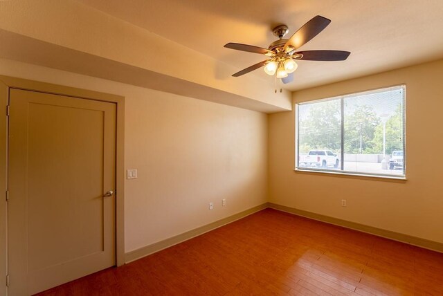 3016 Guadalupe St Unit 212, Austin, TX 78705 - unfurnished room with wood finished floors and a ceiling fan