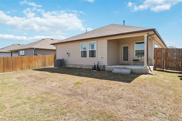 215 Whipporwill Ln, San Marcos, TX 78666 - back of property featuring central AC unit and a patio area