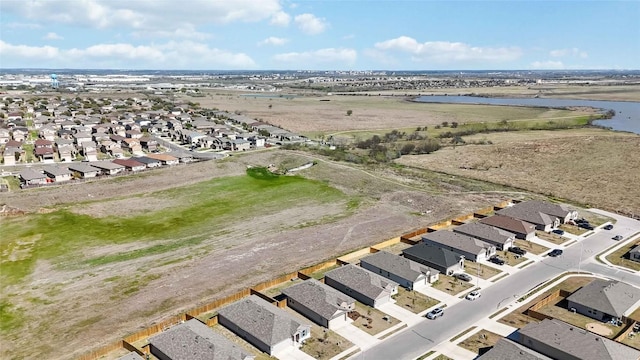 215 Whipporwill Ln, San Marcos, TX 78666 - aerial view of property's location with nearby suburban area and a large body of water