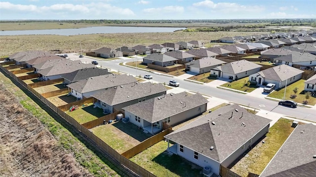 215 Whipporwill Ln, San Marcos, TX 78666 - aerial perspective of suburban area with a nearby body of water