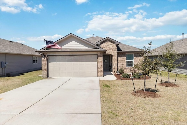 215 Whipporwill Ln, San Marcos, TX 78666 - view of front of home with brick siding, an attached garage, concrete driveway, and a front lawn