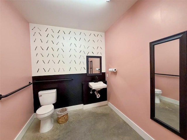 617 Main St, Lexington, TX 78947 - half bathroom with concrete floors and vaulted ceiling