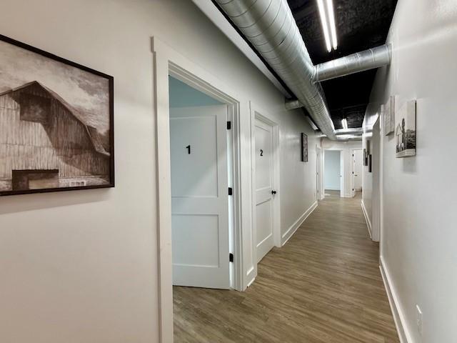 617 Main St, Lexington, TX 78947 - hall featuring wood finished floors and baseboards