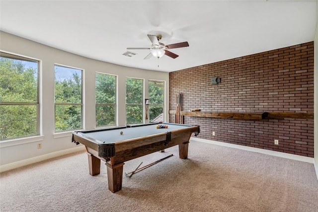 11609 Woodland Hills Trl, Austin, TX 78732 - game room featuring ceiling fan, brick wall, plenty of natural light, and carpet floors