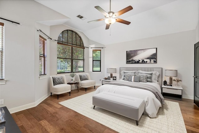 11609 Woodland Hills Trl, Austin, TX 78732 - bedroom with vaulted ceiling, wood finished floors, baseboards, and a ceiling fan