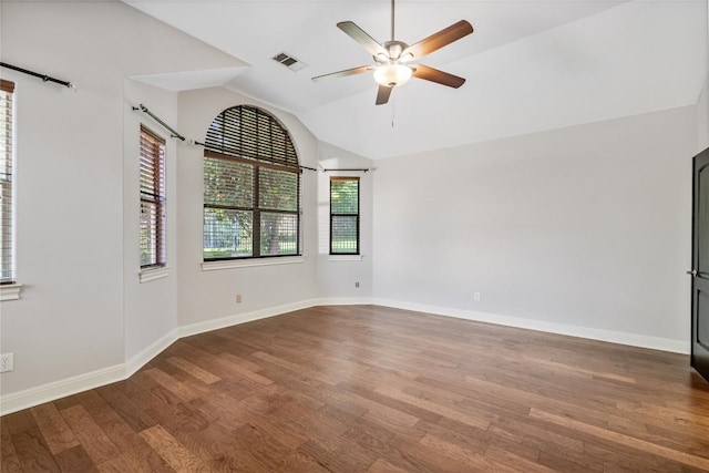11609 Woodland Hills Trl, Austin, TX 78732 - spare room featuring wood finished floors, lofted ceiling, ceiling fan, and baseboards