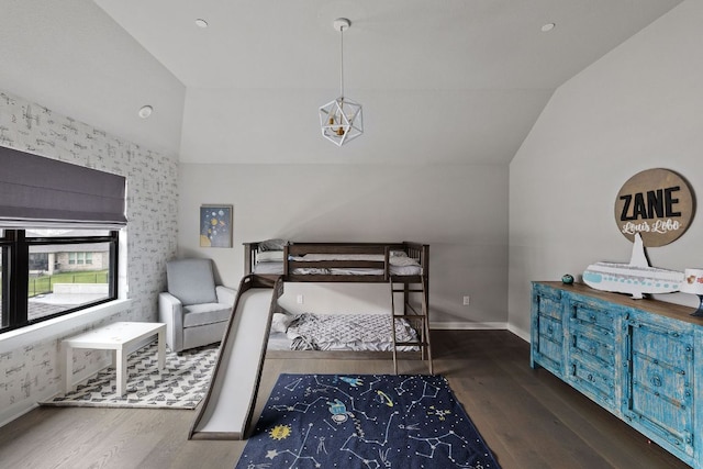 4525 Via Roma Pass, Leander, TX 78641 - bedroom featuring vaulted ceiling and wood finished floors