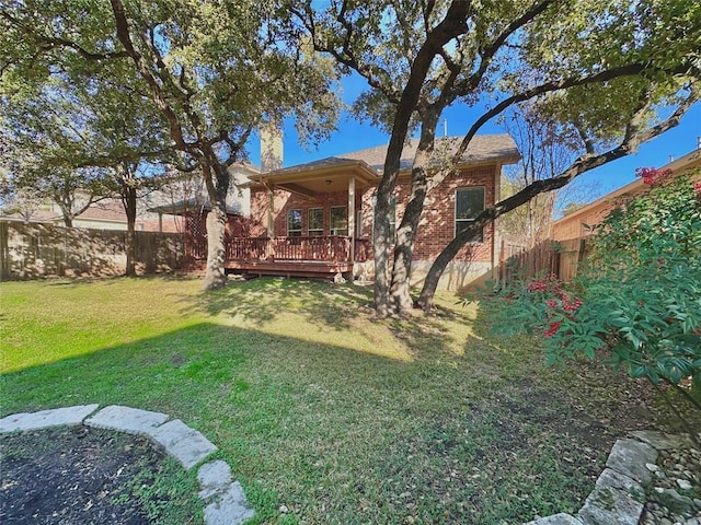 613 Arrowhead Trl, Cedar Park, TX 78613 - rear view of property with a deck, brick siding, and a chimney