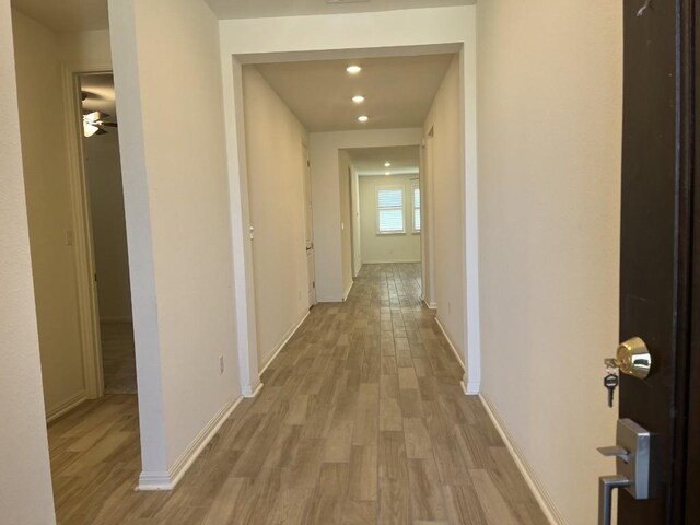 19316 Fernando Trl, Austin, TX 78738 - corridor with recessed lighting, light wood-style flooring, and baseboards