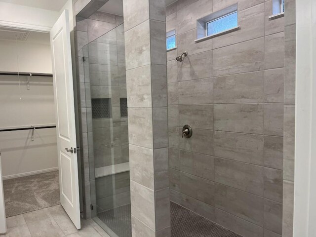 19316 Fernando Trl, Austin, TX 78738 - full bath featuring a walk in closet and a stall shower