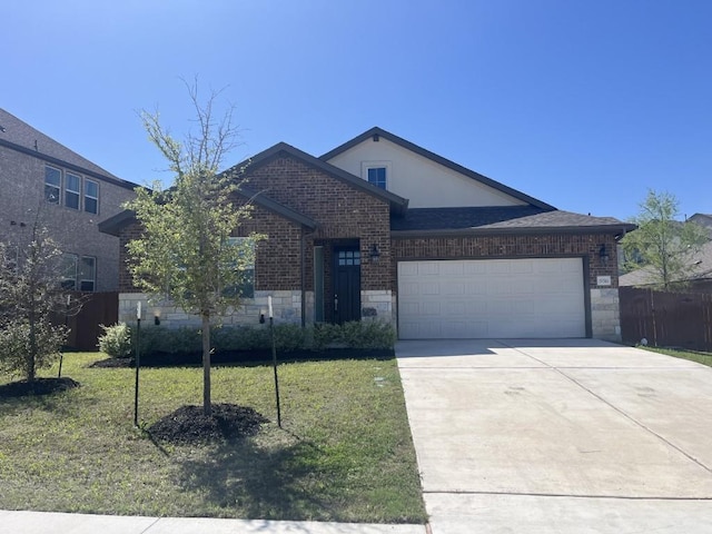 19316 Fernando Trl, Austin, TX 78738 - single story home with a garage, a front yard, concrete driveway, and brick siding
