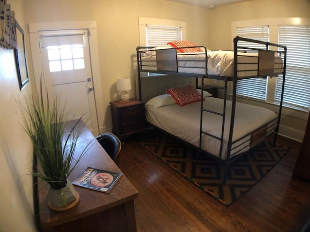 900 W Lynn St, Austin, TX 78703 - bedroom featuring wood finished floors and baseboards