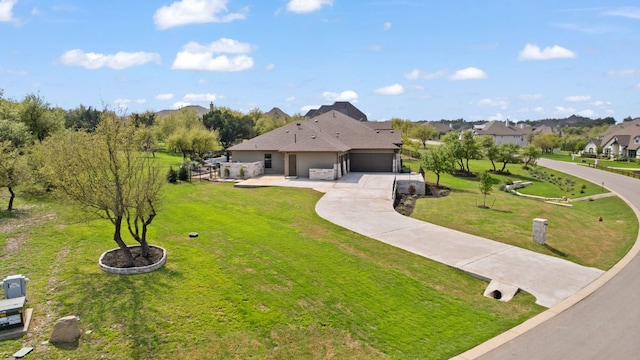 17301 Avion Dr, Dripping Springs, TX 78620 - view of front of property with an attached garage, concrete driveway, and a front yard