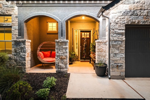134 Soft Elm Dr, Buda, TX 78610 - entrance to property with stone siding and a garage