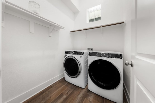 134 Soft Elm Dr, Buda, TX 78610 - laundry room featuring washing machine and clothes dryer, dark wood-style floors, and baseboards