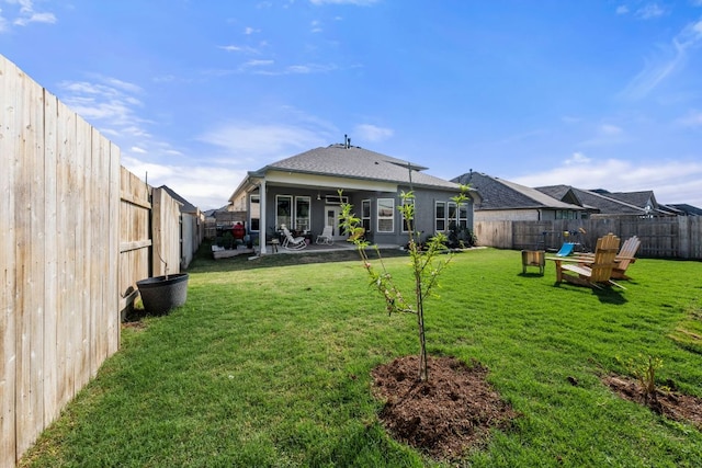 134 Soft Elm Dr, Buda, TX 78610 - rear view of property featuring a patio area and a shingled roof
