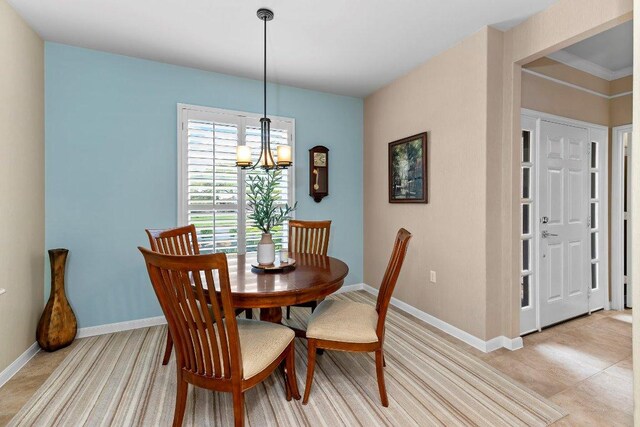 108 Silver Bonnet Dr, Georgetown, TX 78633 - dining area featuring a chandelier and baseboards