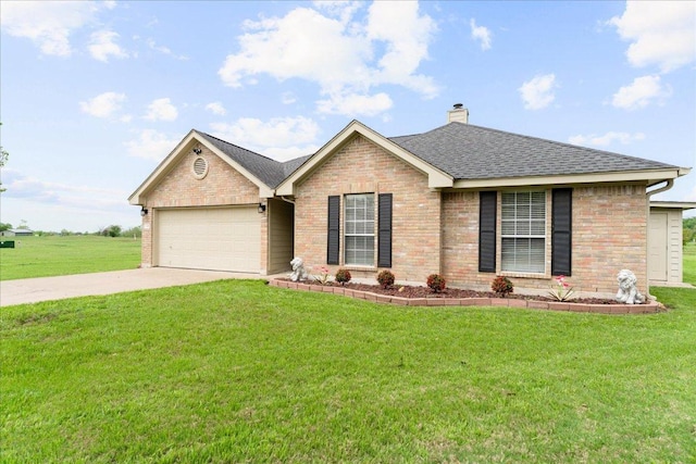 125 Fairway Ct, Bastrop, TX 78602 - ranch-style house featuring an attached garage, brick siding, driveway, and a front yard