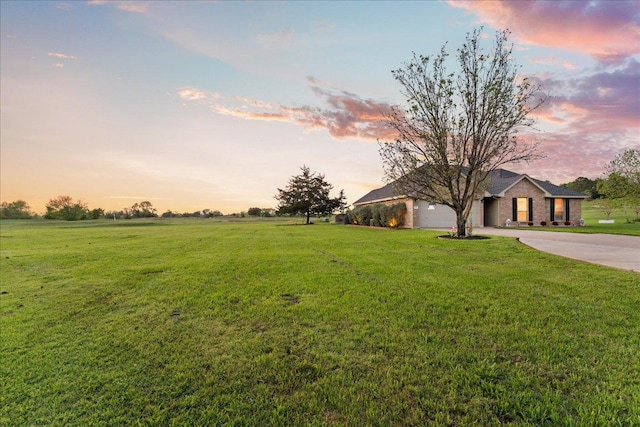 125 Fairway Ct, Bastrop, TX 78602 - view of grassy yard featuring driveway
