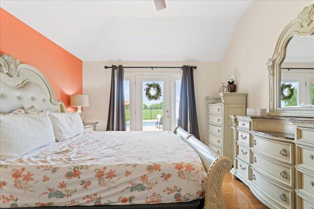 125 Fairway Ct, Bastrop, TX 78602 - bedroom featuring access to exterior, vaulted ceiling, and a ceiling fan