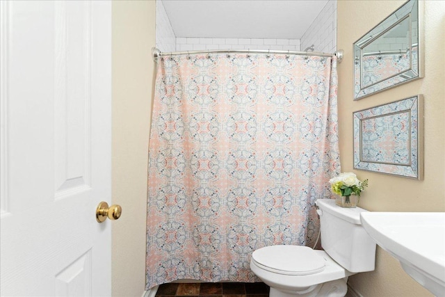125 Fairway Ct, Bastrop, TX 78602 - bathroom with toilet and curtained shower